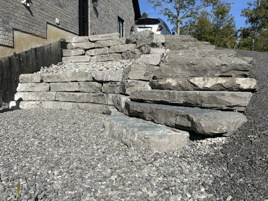 Armour stone retaining wall on rural property