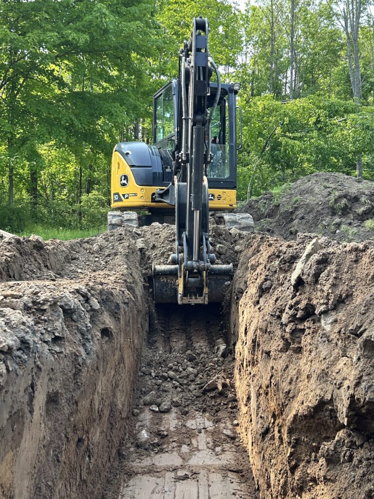 Excavator digging foundation in Clarington