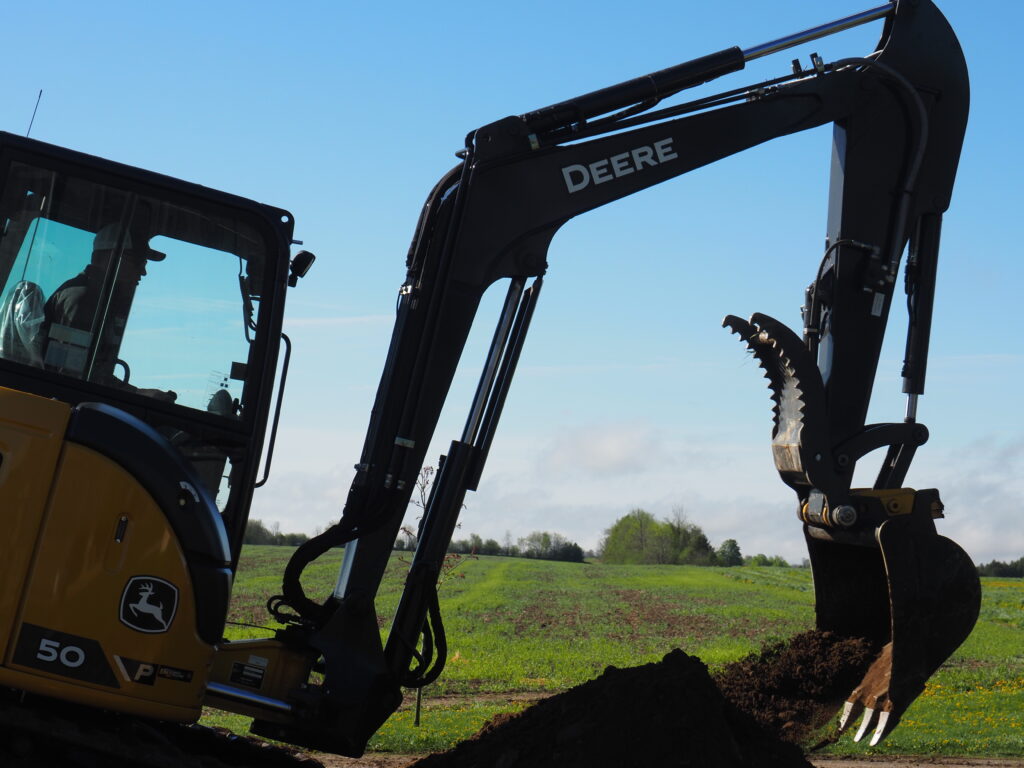 Excavator on rural property Clarington